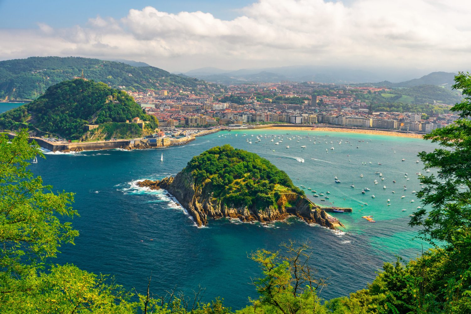 Aerial view of turquoise bay of San Sebastian or Donostia with beach La Concha in a beautiful summer day, Basque country, Spain